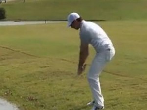 Watch Rory McIlroy make a mess -- and make the wildest par of 2014
