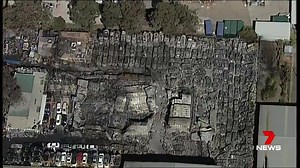 Revesby: Car wrecking yard has survived 4 fires in 17 years. The fire that started yesterday is still smouldering. Story: https://yhoo.it/2fom58D #Revesby #7News | 7NEWS Sydney