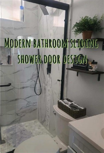 Customer review smart bathroom design. This homeowner installed an ACE Decor Bath black framed sliding shower door, and the details really stand out. One side features a towel-bar handle, while the other keeps things ultra-minimal with a small pivot support design. Both sides slide open, making it easy to enter the shower from either direction. It’s a practical upgrade for modern homes — especially for smaller bathrooms where space and layout matter. Plus it helps keep the shower area separated