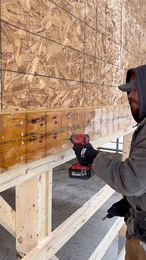 Nailing up and installing the LVL beam that’ll support this massive 24x60 lean to! We worked on this wall a little “bass ackwards” because we would’ve had a tough time finishing up the soffit, fascia and upper gable metal with the lean to trusses installed. But…. Is it really bass ackwards if it’s the most efficient and accurate?! #CinchCarpentry #QualityOverQuantity #PostFrame #LeanTo #Beam #LVL #Framing #Carpentry #WorkShop #Acreage #Building #Construction #Alberta | Cinch Carpentry