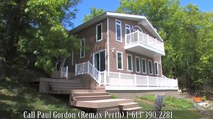 WHAT A VIEW! Waterfront Property For Sale: 1921 Hilltop Dr, Tay Valley, Ontario (On Bennett Lake) Spectacular pan Abode log 4 Season 4 bedroom Cottage on Bennett Lake. The views from the kitchen/ living area with its many large windows are breathtaking. The dwelling has been well maintained and boasts an elaborate docking system for the boating enthusiast. Attached 20 x 30 garage. Sand Volley Ball Court. New carpet, laminate flooring and paint. Bennett Lake including the Fall River and Fagan Lak
