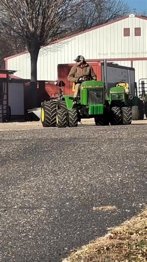 This is a 1986 John Deere 420 that we customized in our shop. It is powered by a Kubota D1105, with a KP 35 Turbo charger and enhanced by some of Bob's magical mechanic work. It has a Cub Cadet rear end, a Cub Cadet 5264 front axel and is a mechanically driven 4WD. We custom designed the transfer case and the dual adapters. Check out the Carlyle TruPower 26 x 12 x 12 back tires and the OTR Lawn Trac front tires. The Hold My Beer decal was designed by Tanner. We will add more photos and videos as