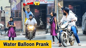 5.5M views · 129K reactions | Throwing Water Balloons From Bike |...