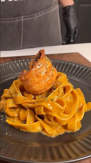 Decadent, buttery lobster tossed in a creamy garlic sauce, served over perfectly cooked pasta.