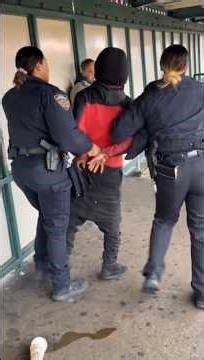 Man was handcuffed and arrested by two female police officers.