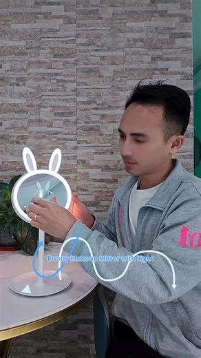 Desktop Makeup Mirror with Ambient Light 3-Level Dimming Lights Ten X Magnetic Magnifier Storage Base Adjustable Angle Rechargeable Battery Multifunctional Cute Bunny Design Gift for Women Perfect for Foundation, Eyelashes, Lipstick, Trimming #beautygifts #beautymusthave #vdaymakeup #stylishgadgets #weddingmirror #bathandbodyworksvalentinesday2026 #mirrorwithlights #barbermirror #beautygadgetfinds #perfectchristmasgift