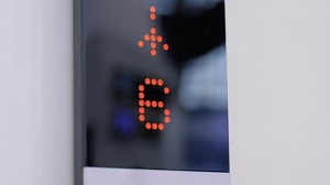 clip-1069404982-digital-elevator-display-showing-orange-floor-number