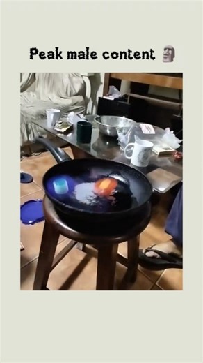 Random Scroll on Instagram: "The video captures an intense "Beyblade" battle taking place within a flaming frying pan, merging childhood nostalgia with high-stakes visual spectacle. This content leverages the psychological appeal of destructive testing and kinetic energy, which are powerful drivers for viral engagement among demographics interested in hobbyist subcultures and sensory-heavy experiments. The visual narrative relies on the contrast between the controlled mechanical rotation of the 