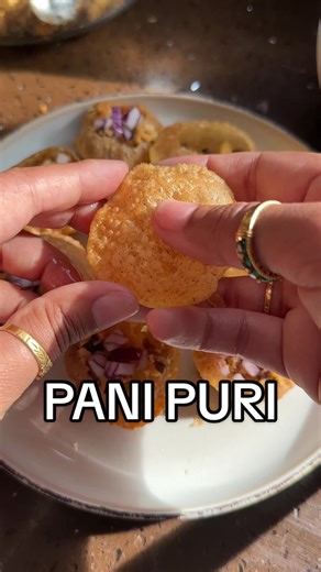 A fantastic explosion in your mouth And don't forget you can buy the puri from almost all Indian grocery shops, we do this like 80% of the time so its totally fine to do. You can also have these simpler without the yoghurt topping PURI ⅓ cup wholewheat flour ⅔ cup fine semolina ⅔ cup plain flour ⅔ cup hot water Knead all the ingredients into a soft dough (the water must be hot) and allow it to rest for 30 mins Get a big pot of oil, enough for deep frying on a medium heat. Portion the dough into 