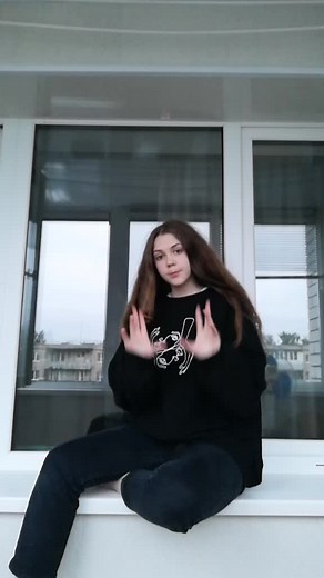 Sign Language Dance Routine on a Windowsill