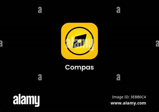 Compas app icon with a bold yellow rounded square background and a dark compass rose symbol centered, representing navigation and direction finding tools Stock Video Footage - Alamy