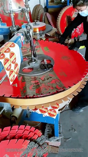 Worker Operating Huge Firecracker Winding Machine