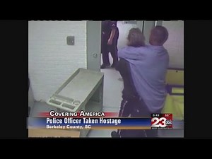 Police officer taken hostage