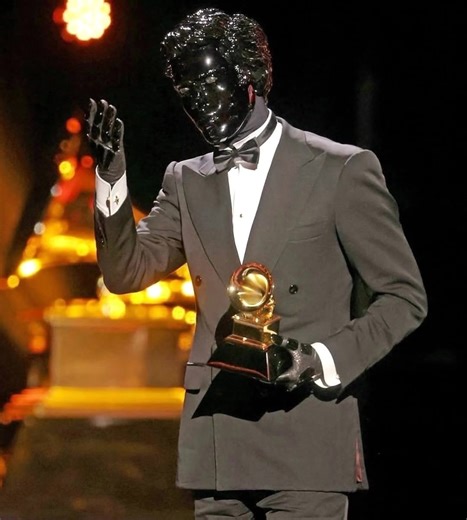 gesaffelstein recently went viral after making a rare appearance to accept his award at the 2026 grammys... the french producer, known for his industrial approach to electronic music, kept his face hidden behind a black mask throughout the ceremony. having produced for kanye west, the weeknd, lady gaga, and many others, he says he prefers to let the music speak for itself and has given very few public interviews.