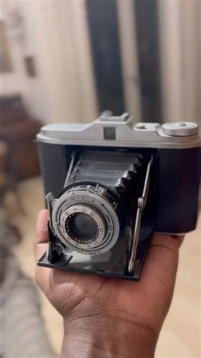 This is an Agfa Isolette V, a medium format folding camera 1950