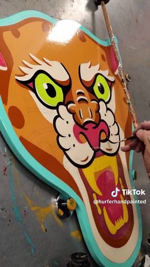 Painting a leopard head wood cutout. Check this one out in Philly Jan 26-28th at Villain Arts Tattoo Convention. #painting #traditionaltattoo #leopard #oddlysatisfying