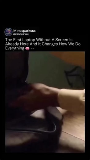 mindsparksss on Instagram: "Your laptop just disappeared, and your workspace got bigger.⚡👀 This device replaces a physical display with a private virtual workspace projected through lightweight AR glasses, creating the feeling of a 100-inch screen floating in front of you. Instead of opening a lid, you put on the glasses and your full desktop appears in mid-air, visible only to you, whether you're in a cafe, on a plane, or in a shared office.By removing the screen entirely, this approach solves