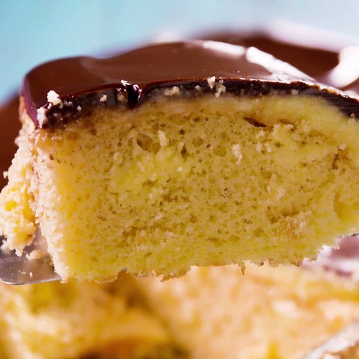 This BOSTON CREAM POKE CAKE is wicked easy and amazing: http://dlsh.it/AJzZpPP FULL RECIPE: http://dlsh.it/DK2X3ka | Delish