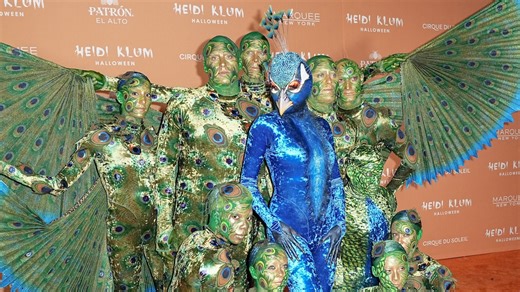 Heidi Klum on Dazzling Peacock Halloween Transformation (Exclusive)
