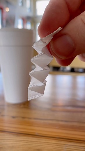 How to make a paper spiral with drinking straw wrapper in a restaurant. This is a fun and easy paper craft activity to keep your kids from getting bored when you go out to eat. This easy straw wrapper craft is a great boredom-buster for kids. Keep your kids entertained in a restaurant. Paper folding trick works great with straw papers you get at restaurants. #kidsart #easycrafts #kidscrafts #papercraft #kidsactivities #crafty | Timm Sevitz