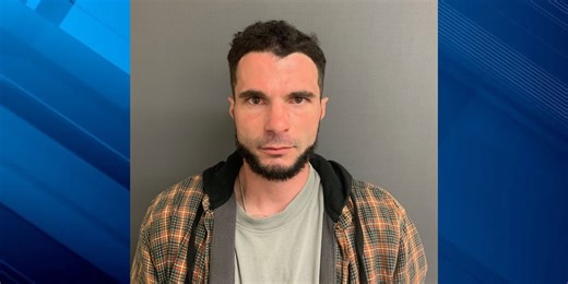 Man accused of threatening to shoot officers, leading police on snowmobile chase