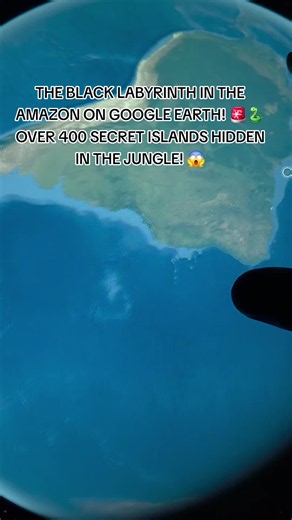 Google Earth takes us deep into Brazil along the Rio Negro, where satellite images reveal the Anavilhanas Archipelago, a massive maze formed by over 400 elongated islands creating a hypnotizing labyrinth of black water channels through the tropical rainforest. At coordinates 2°39'24.8