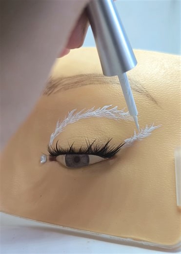 Create a Stunning Feathery Eye Look with White Eyeliner