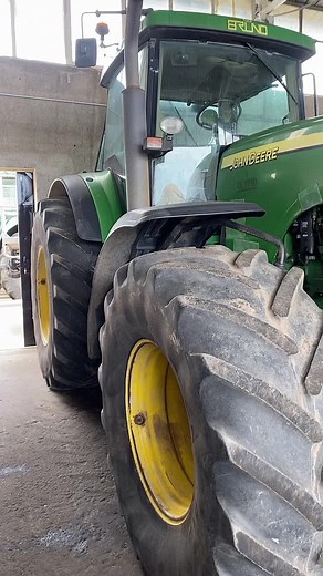 John Deere Tractor Features Inside a Barn