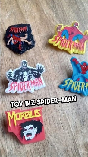 What did you do with the pins that can packaged with the ToyBiz Spider-Man action figures?