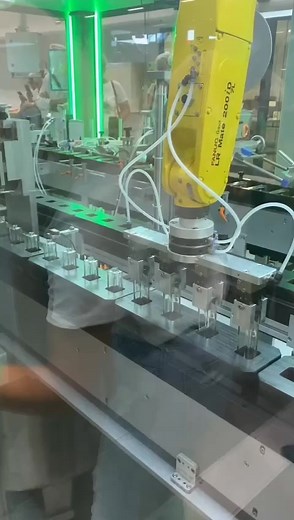 Industrial Machine Automation with Robotic Arm