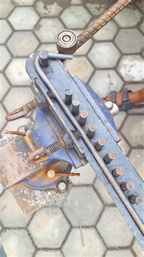 he made triangular rings for the frame of the pole