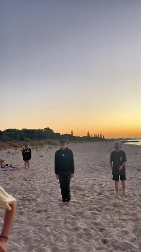 Middle-Aged Man Jumps in Busselton Hole at Sunset