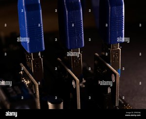 Riser for mining on video card. Device for collecting a mining farm. Mining board.Microcircuit for connecting video card. Selective focus. Macro Stock Photo - Alamy