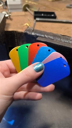 Hand engraving on an aluminium tag