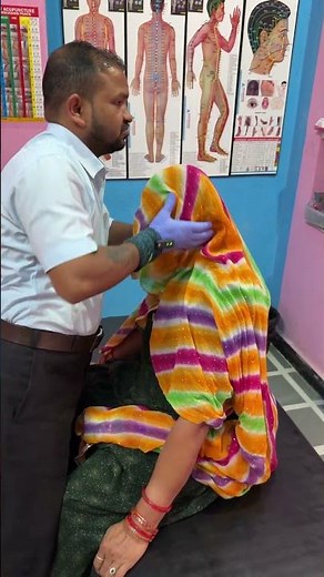 Chiropractor treatment for forehead and hand
