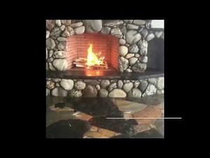 Alaskan River Rock Stone Fireplace by Marty Raney