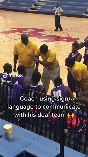 Deaf Basketball Team Coach Communicating with Sign Language