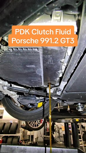 PDK clutch fluid is due at 6 years on the 911. Don't get it confused with the differential service interval of 12 years! Want your car featured? Send me a DM. Find the light and other tools I use linked in my bio. #cartok #dealershiplife #porsche #991gt3 #pdk