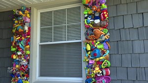 Fredericton man replaces his window shutters with more than 6,000 toys to celebrate no flooding this year