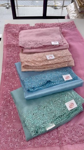 Delivery Time :3-7 days www.mcollections.store Search Code :CW0166 Whatsap: 917559912362 , 918848712362 Price :2700/- A graceful glass organza saree featuring a delicately detailed thread-worked border that adds subtle charm. The fabric is sheer, crisp, and lightweight with a graceful fall, giving it an ethereal, elegant feel. Paired with a matching running blouse piece in the same fabric, enhanced with intricate sleeve-end embroidery for a refined finishing touch—perfect for special occasions t