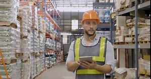 Hispanic men hands using typing laptop computer Warehouse management logistics counting checking products on inventory shelf. Engineer Man hands checklist stock control computer program in storage