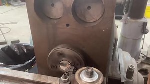 My Kearney Trecker 3-H milling machine with the “optional lathe feature!” I needed to turn the center stub of the drive gear for my Universal Head down about 0.075” for better clearance. No need to pull it all off and go to the lathe, just slap the tool post done the lathe on the mill table and turn it in place! #vintagemachinery #kearneytrecker #horizontalmill #machineshop #machinist #instamachinist #shoplife | VintageMachinery.org