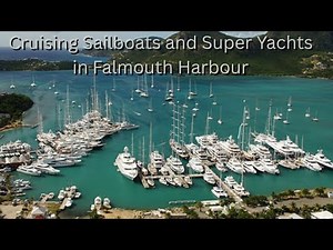Cruising Sailboats and Super Yachts around Falmouth Harbour