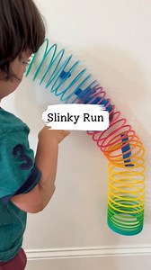 Slinky Run: painters tape a slinky makes for a fun activity on the wall! 🎉 here I used a giant one but you could use a smaller size with plastic golf balls. The kids thought it was a pretty cool oversized marble run 🥰 I've linked this slinky via my profile or comment SLINKY and I'll send you the link! Follow @bymelissakate for more fun ideas. #kidsactivities #toddlermom #kidsactivityideas #kidsactivity #toddleractivity #toddleractivityideas #sensorytable #simpleactivities #toddlerplay #boymom 