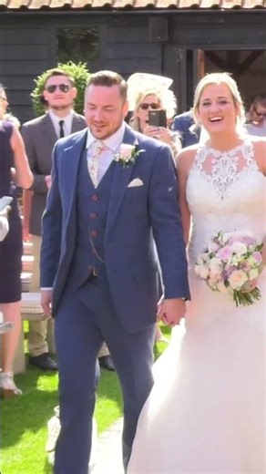 Bride and Groom Walking Down the Aisle