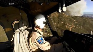 Pilots reflect on rescuing people and dogs during California wildfires