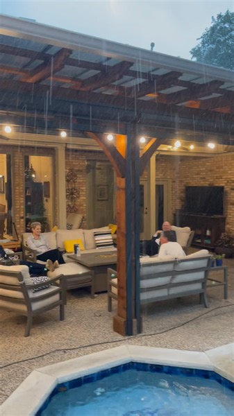 1.1M views · 10K reactions | It’s pouring freaking rain ️ in Dallas. No worries. Our pergola has a SkyPoly Pergola Cover. So WE, are DRY.  #pergola #patiocover #pergoladesign #skypoly #outdoorlivingspace #backyarddesign #patiodesign | Cover Your Pergola | Facebook