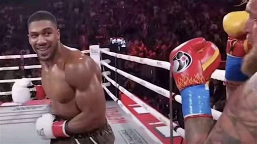 Anthony Joshua Smiling at Jake Paul Before Punching Him | Know Your Meme