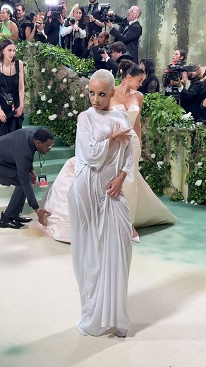 9.3M views · 10K reactions | Yes, you saw that right. @dojacat wore chrome tears (with some help from @patmcgrathreal) and a wet @vetements_official t-shirt to the 2024 #MetGala. Head to the link in bio for all of the details. | Vogue | Facebook