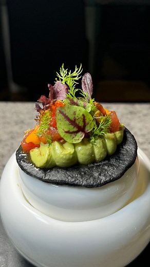The Boujee Foodie on Instagram: "Yellowfin Tuna Tartare with avocado lime cream toastada. Full Recipe: https://gronda.link/w2q4DtD9EMb The best sashimi grade yellowfin tuna, delicately dressed in ponzu with ginger and shallot, salty soy, fresh lime and zest, sesame oil and of course mirin and sake. Adding a cooled and zesty lime and avocado cream made with crème friache, and dusted with spiced togarashi blend and sesame seeds. Finish this all on a crunchy charcoal shell deep fried to make sure i